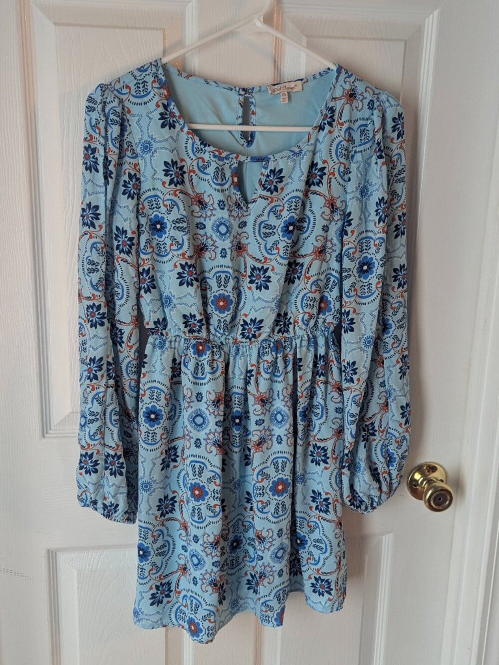 Red Camel dress in various shades of blue with white and orange accents - XD